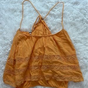 Free People top! Size L - but very adjustable and can fit a M!!!